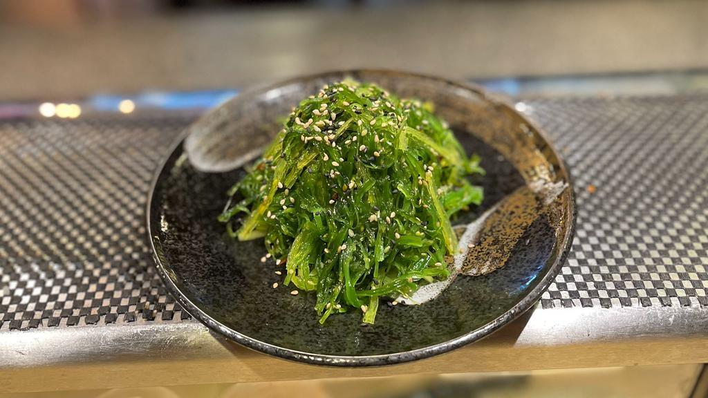 Seaweed Salad · marinated shredded green seaweed.