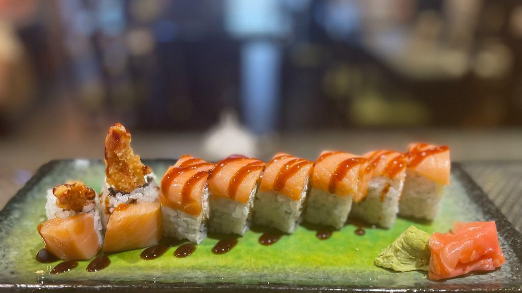 Crazy Roll · Shrimp tempura, cream cheese inside smoked salmon on top with special sauce.