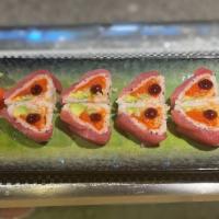 Sweet Heart Roll · Spicy tuna, avocado, cucumber roll in soy seaweed, fresh tuna on top with special sauce.