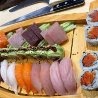 Sushi Boat For 2 · Ten pieces sushi, twelve pieces sashimi with spicy tuna and dragon roll.