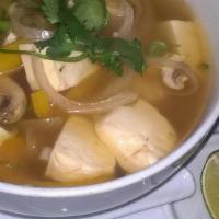 Tom Yum Soup · Spicy lemon grass soup with mushrooms, cilantro and choice of protein.