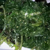 Seaweed Salad · Marinated seaweed with sesame seeds.