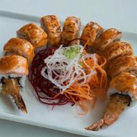 Miami Heat Roll · Crab salad, cream cheese and shrimp tempura with baked salmon on top.