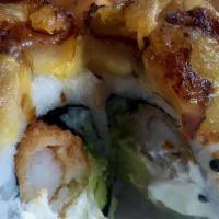 Monkey Roll · Cream cheese, avocado and shrimp tempura topped with fried plantain.