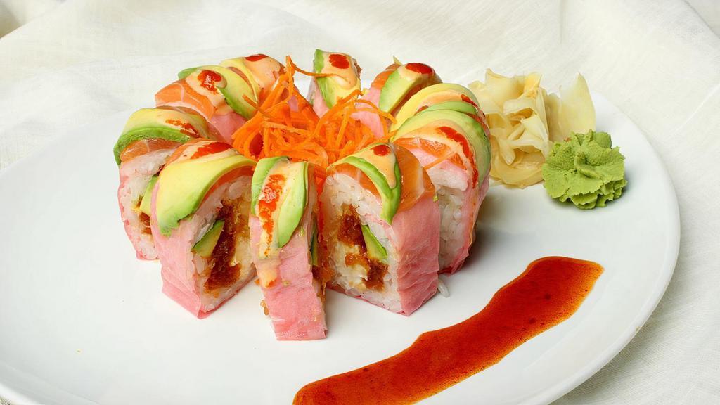 Sunrise Roll · Spicy tuna, tempura flakes, avocado and cream cheese topped with salmon and avocado, rolled in soy paper.