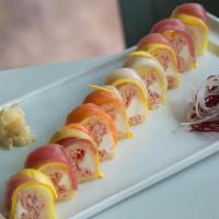 Isushi Roll · Crab salad and cream cheese wrapped in soy paper topped with salmon, tuna, white fish and ma...