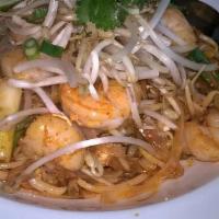 Pad Thai · Sauteed rice noodles in our sweet tamarind sauce garnished with bean sprouts, peanuts and sc...