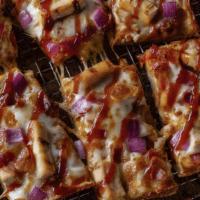 Bbq Chicken · BBQ sauce, premium mozzarella, grilled chicken, bacon & red onions 300-430 cal / slice