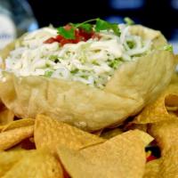 Taco Salad · A crispy flour tortilla shell filled with grill chicken or steak or ground beef or veggies t...