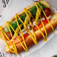 Chicago Dog · Beef hot dog topped with tomato, sport peppers, sweet relish, onions, mustard, celery salt, ...