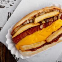 La Dog · Bacon-wrapped beef hot dog topped with chili cheese fries and grilled onions.