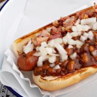 Boston Dog · Beef hot dog topped with FACTORY baked beans, bacon bits, and onions.