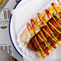 All American · Classic beef hot dog topped with ketchup, mustard, relish, and onions.
