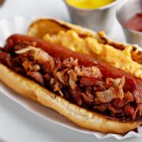 Breakfast Dog · Bacon-wrapped beef hot dog topped with a fried egg and shredded cheese.