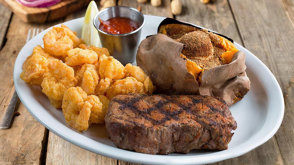 Steak & Shrimp Combo* · Our famous 9 oz. sirloin paired with ½ lb of fried or grilled shrimp. Served with your choice of one homemade side and a house salad.