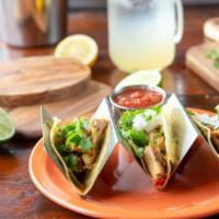 Fish Tacos · 3 Fish Tacos served with coleslaw, corn and black bean salsa and a zesty ranch dressing. You...