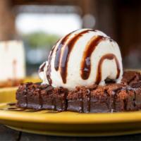 Brownie Delight · Warm chunky chocolate brownie served with a scoop of vanilla ice cream, drizzled with chocol...