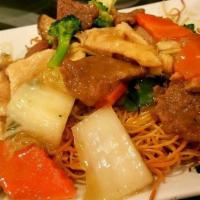 House Pan-Fried Noodles · Beef, shrimp, chicken, roast pork, and vegetables over Pan-Fried egg noodles