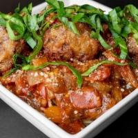 Spaghetti And Meatballs  · Meatballs with Spaghetti in scratch made sauce