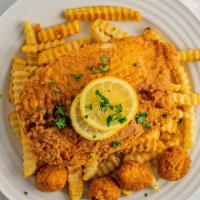 Tilapia Fish Basket  · One Fish Fillet, French Fries and , 4 Hush Puppies