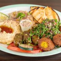 Mixed Appetizers · Hummus, baba ghannouj, tabbouleh salad, 3 pieces falafel, 3 pieces stuffed grape leaves. Ser...