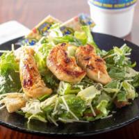 Caesar Salad With Grilled Tenders · Croutons, grated parmesan cheese,  Caesar dressing on the side.