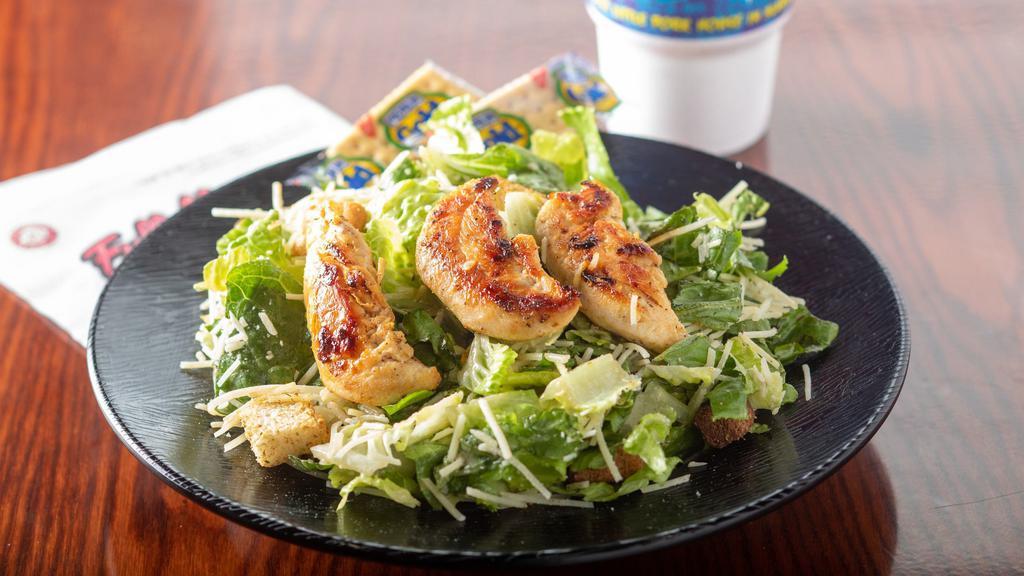 Caesar Salad With Grilled Tenders · Croutons, grated parmesan cheese,  Caesar dressing on the side.