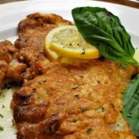 Chicken Francese · Dipped in egg and sautéed in lemon butter and white wine.