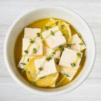 Tofu · Meiji Tofu, olive oil poached with thyme and garlic