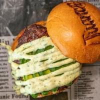 Caribe Burger · Jsb beef patty, grilled white cheese, avocado, fried plantain, and our signature honey ginge...