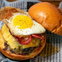 Sunny Burger · Jsb beef patty, American cheese, bacon, and fried egg drizzled with honey and your favorite ...