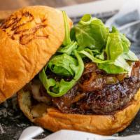 Truffle Goddess Burger · Jsb beef patty, caramelized onions, brie cheese, and roasted peppers topped with arugula and...