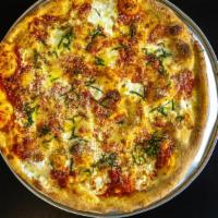Margherita Pie · Fresh mozzarella, marinara sauce and basil