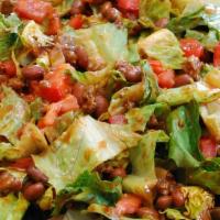 Taco Salad · Crispy flour tortilla with beef or chicken, beans, lettuce, tomatoes, cheese, sour cream and...