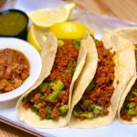 Tacos Galle  · Three tacos with homemade chorizo, chopped avocado and pico de gallo, served with charro bea...