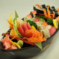 Nami Boat For One · Serves 1 person. 8 pieces assorted sushi, 4 pieces of California roll inside outside, 9 piec...