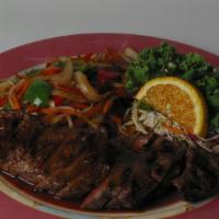 New York Steak · Tenz. New York strip grilled with teriyaki. Served with choice of miso soup or salad.