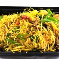 Singapore Rice Noodles With Curry Flavor · Served with curry flavor.