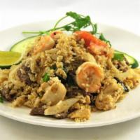 Thai Fried Rice · Shrimp, chicken, and beef with onion, scallions, basil, tomato, and egg.