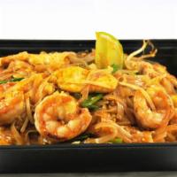 Pad Thai · Shrimp, chicken, rice noodles, beansprout, green onions, ground peanut, and egg in a classic...