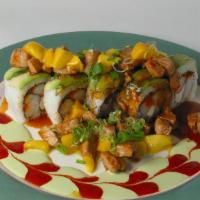 Mango Tango Roll · Crab, cream cheese, and masago inside, outside with avocado and topped with grilled tuna.
