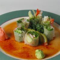 Summer Breeze Roll · Shrimp, crab, cucumber, seaweed salad, and romaine lettuce rolled with a rice wrap. This rol...