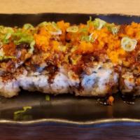 Dynamite Roll · Baked scallops with mayonnaise and masago.