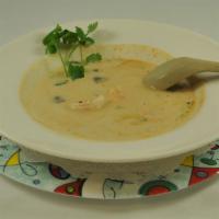 Tom Kha Goong · This creamy soup reflects the outstanding flavor of coconut milk, galangal, and lemongrass (...