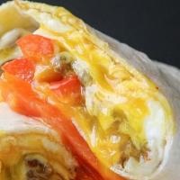 Philly Cheesesteak Breakfast Burrito · Two scrambled eggs, chopped steak, grilled onions and peppers, sauteed mushrooms, and melted...
