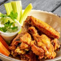 West Avenue Chicken Wings · Eight chicken wings served with celery, blue cheese sauce and coated in your choice of sauce.