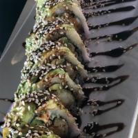Komodo Dragon Roll · Shrimp tempura, avocado, asparagus, and spicy mayonnaise scallion topped with sliced avocado.