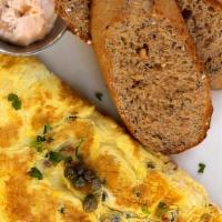 Salmon Omelette · Onions, capers and dill cream cheese.