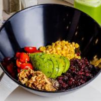 Quinoa · Cherry tomatoes, cranberries, corn, avocado, walnuts, olive oil vinaigrette. Add protein for...