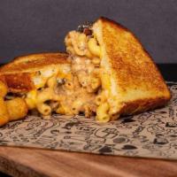 Best Of Both Worlds Grilled Cheese Sandwich  · A Baked Mac & Cheese Sandwich with Slow-Cooked Short Rib, White Cheddar Cheese, and American...